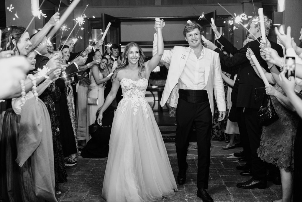 The couple making their sparkler exit.