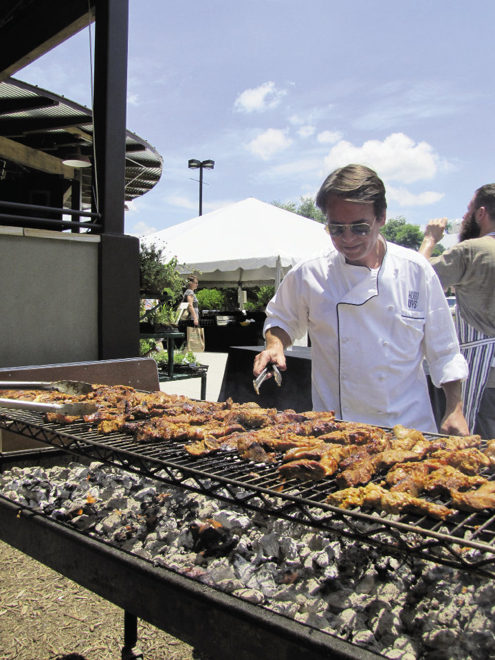 South African Chef Hugo Uys grilled meats for the traditional feast.