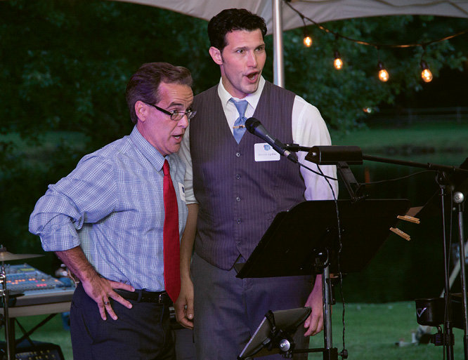 Actors Dr. Bill Martin and Dominic Aquillino performed a song from the musical The Denim King: The Moses Cone Story.