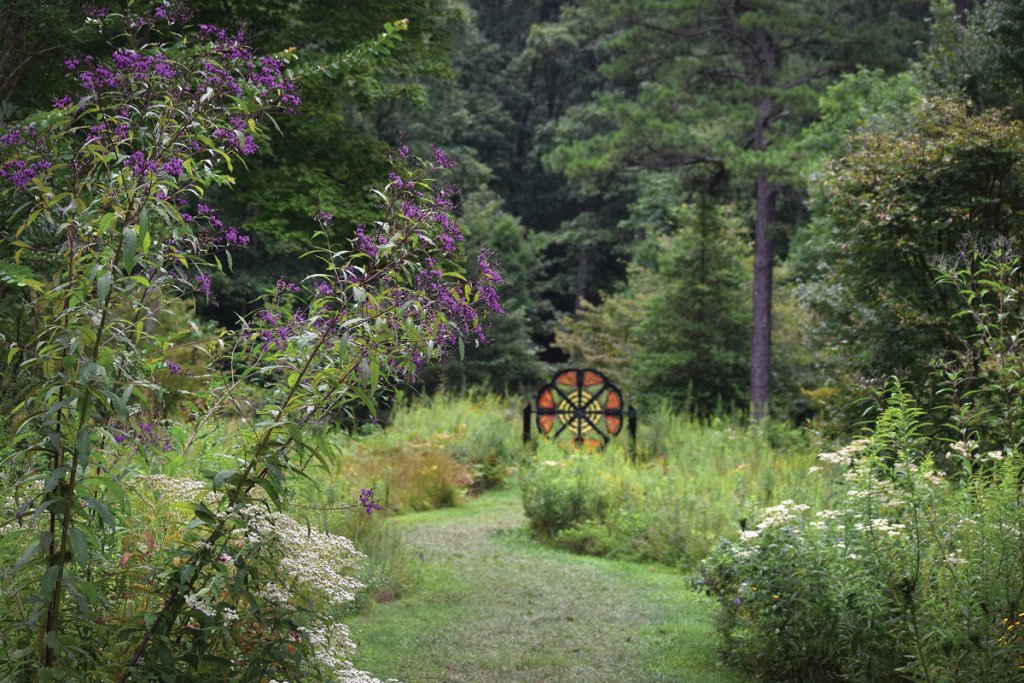 There are several short hiking and walking trails around the campus, and many have hidden works of art along the path.