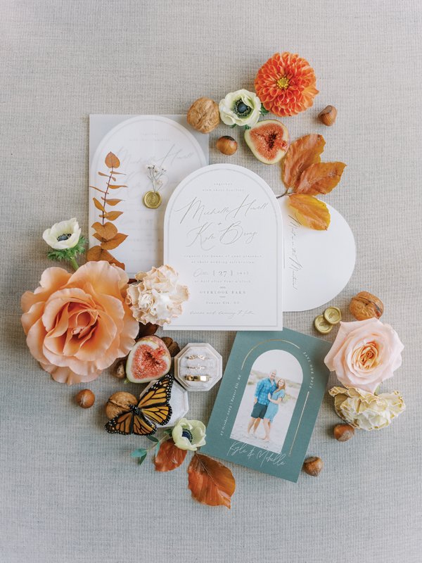 A gorgeous autumn flat lay of all the wedding details.