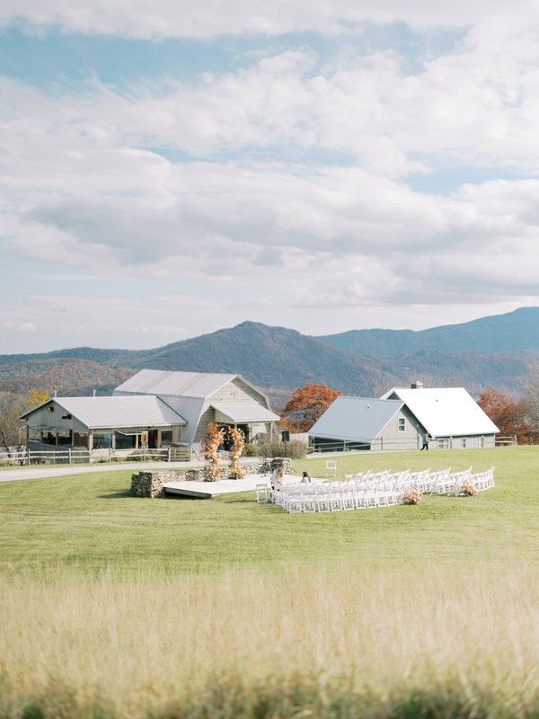 View from Overlook Barn’s outdoor ceremony site with mountain views.