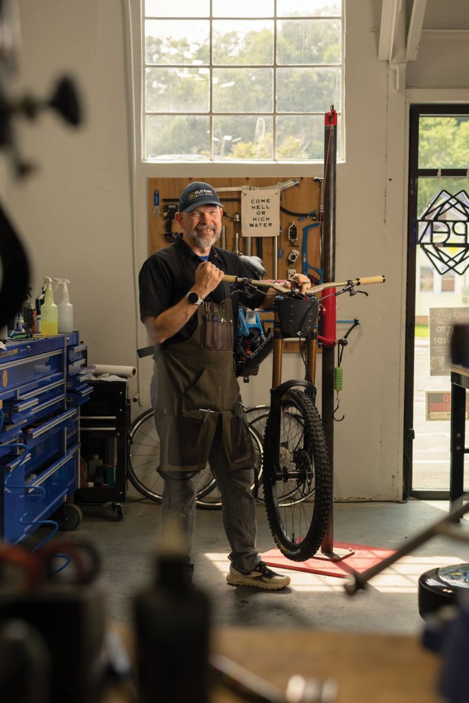 Chad Schoenauer, owner of Old Fort Bike Shop, lost a lot of inventory because of the flooding that reached the downtown area.