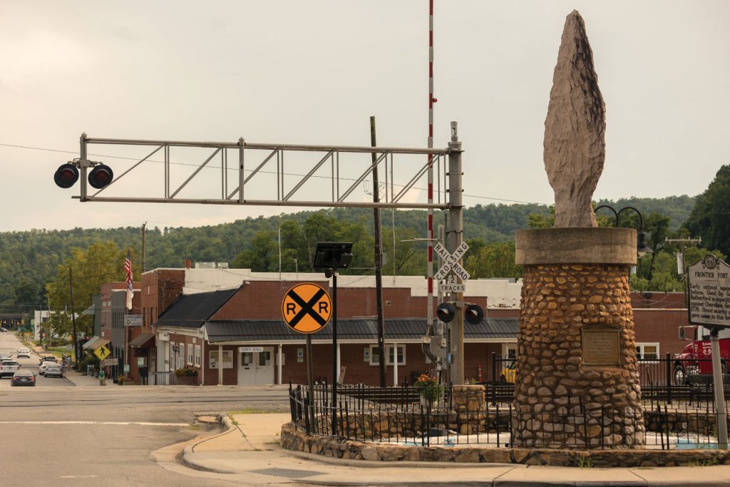Next to the Old Fort Train Depot is the Arrowhead Monument (top), a 14.5-foot statue made from pink granite that was designed to recognize the peace treaty between the indigenous Cherokee and Catawba people.