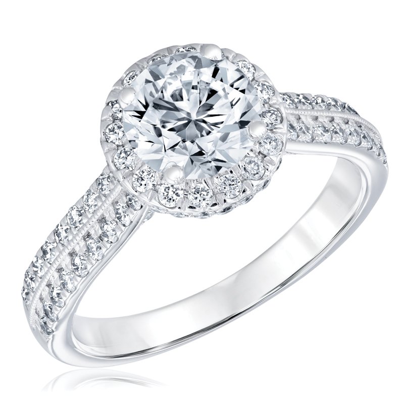 British Brilliance - The Downton Abbey Ring. 14 karat white gold with a round lab-gown 1.5 carat diamond surrounded by grown diamonds in a halo style. $4,299.99. Reeds Jewelers, Asheville. reeds.com