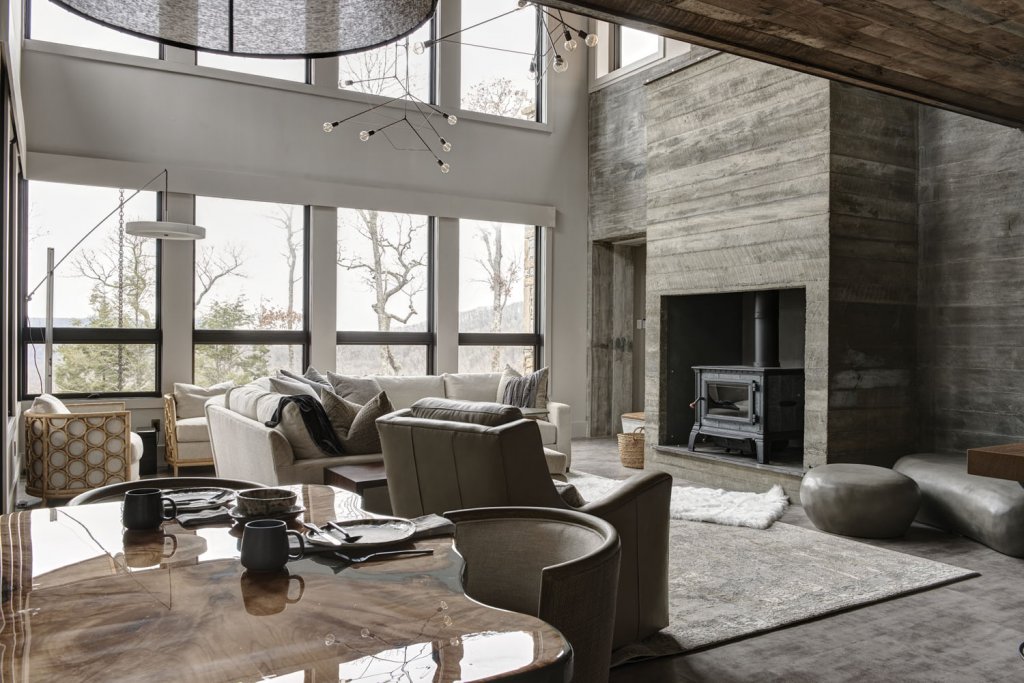In the living room, a custom soapstone stove provides ambient warmth for the winter months.