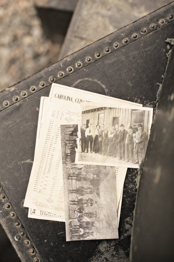 Old photos of the early railroad days, a train schedule printed to look old, a vintage suitcase, and antique mining tools  were among the props gathered to help retell the story of Spruce Pine’s past.