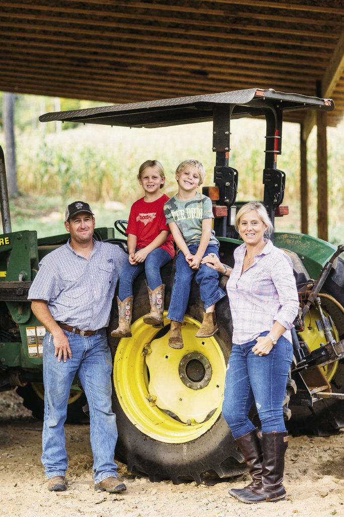 For the Barkleys, running the farm and making grits is a family affair, with all three of Jim Barkley’s daughters, their spouses, and children pitching in to help during the harvest. Left, farm manager Micah Stowe with his wife Auburn (one of Jim’s daughters) and their two children, Olivia (center left) and Barrett