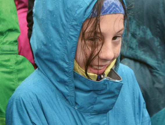 Chloe Jackson of Ira B. Jones Elementary stayed upbeat on a rainy winter day.