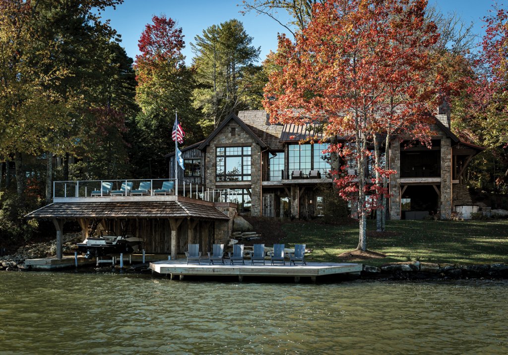 JP and Linda’s son’s bedroom (above) connects to an outdoor patio space that overlooks the lake. The Matzigkeit home also has a boat house