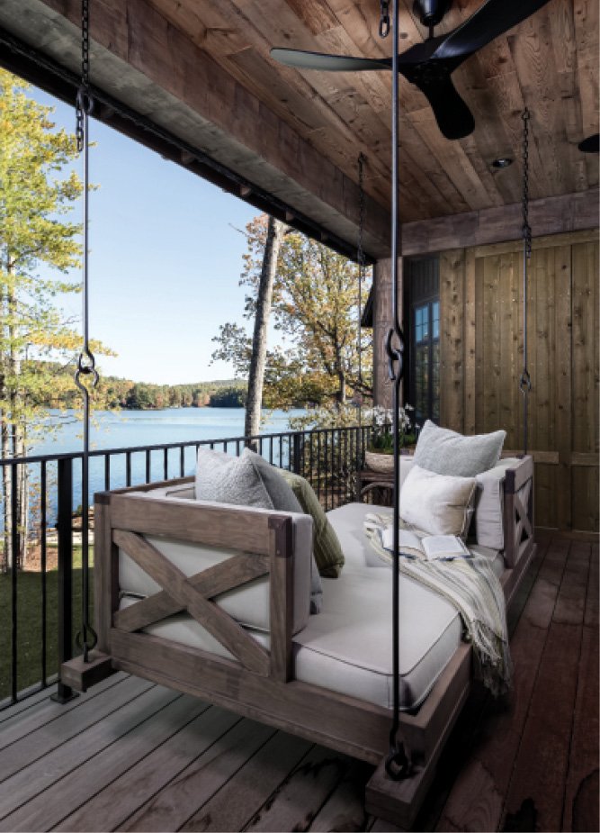 The architect included a variety of access points to the outdoors, including a sleeping porch (complete with bedswing) and a drop zone for towels and coolers near the lakeside entrance.