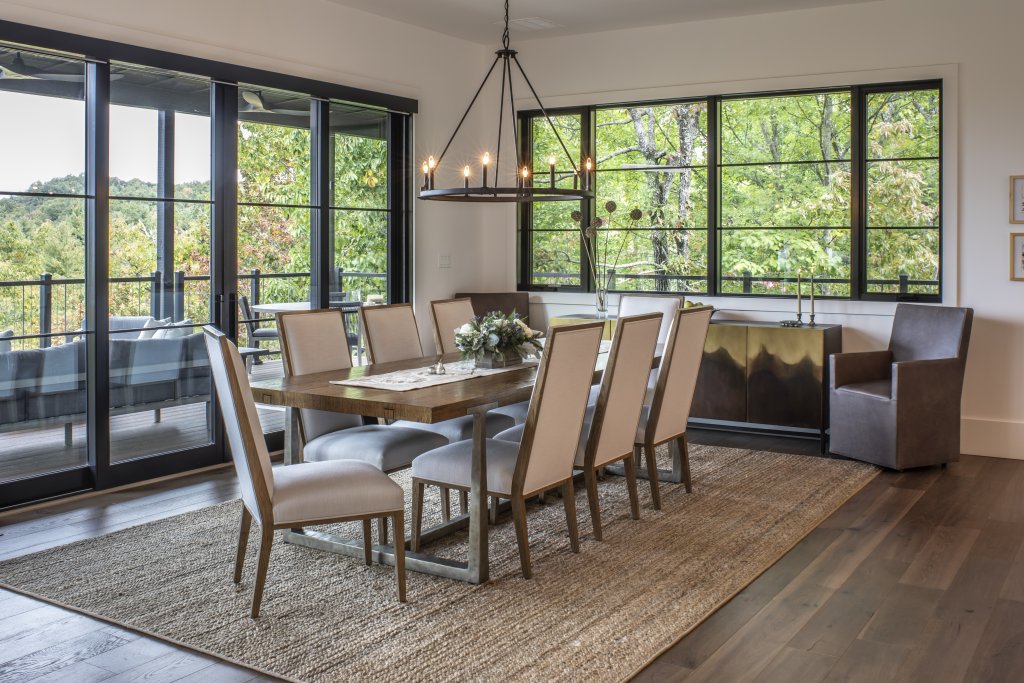 In the dining room, sliding panel doors open up the eating space to the porch.