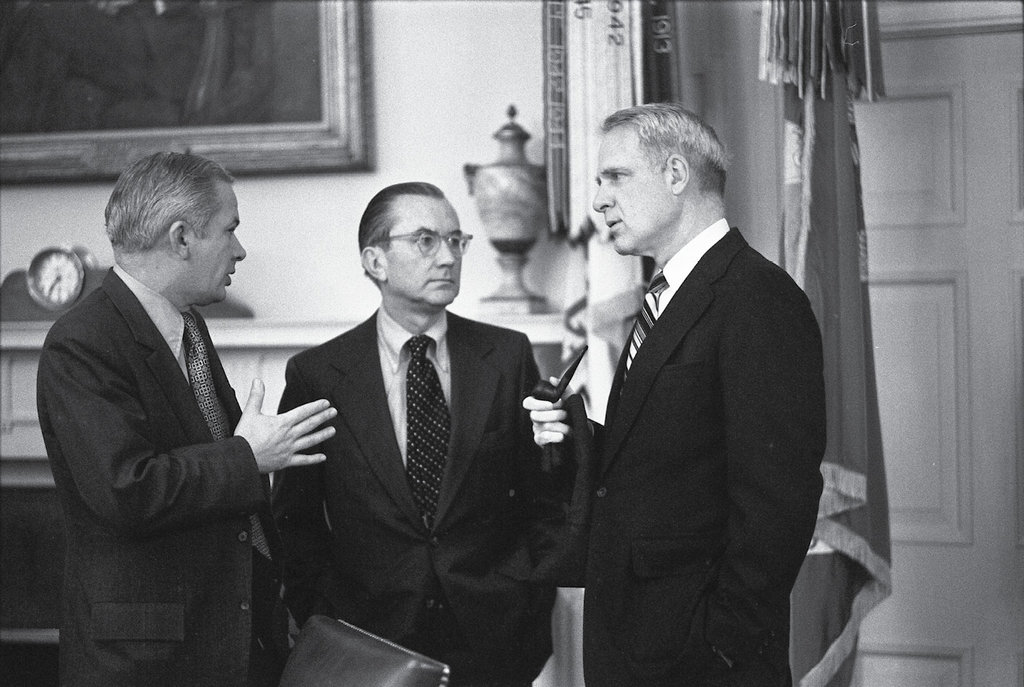 Duckett participates in a briefing at the White House in March 1975 with CIA Director William Colby (center) and Secretary of Defense James Schlesinger (right).