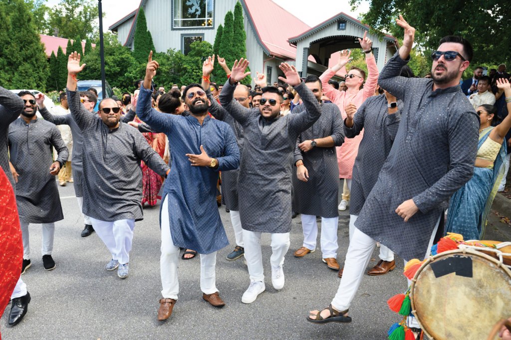 A fun-filled procession with the groom’s wedding brigade.