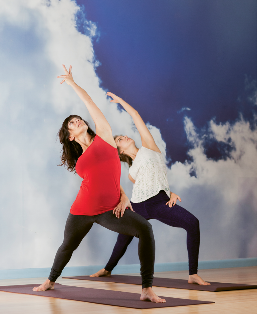 Asheville Yoga Center instructors Shala Worsley (left) and Cea Rubin