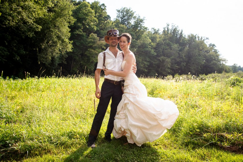 Alexander Komarov and Karin Petersen added Victorian industrial accents to their wedding attire.