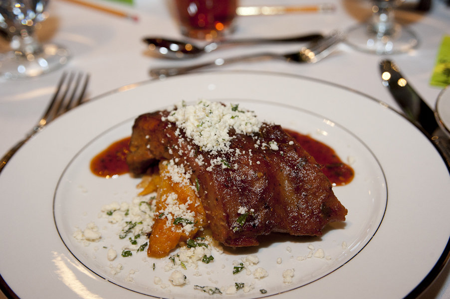Voted as the evening&#039;s No. 1 dish, team Never Blue&#039;s sticky sweet potato Thai potion-drenched baby back ribs over sweet potato goat cheese gratin with a cilantro queso fresco gremolata.