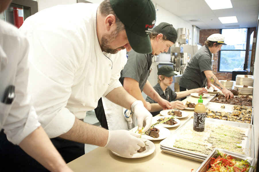 Team LAB plating their blueberry-ginger short ribs.