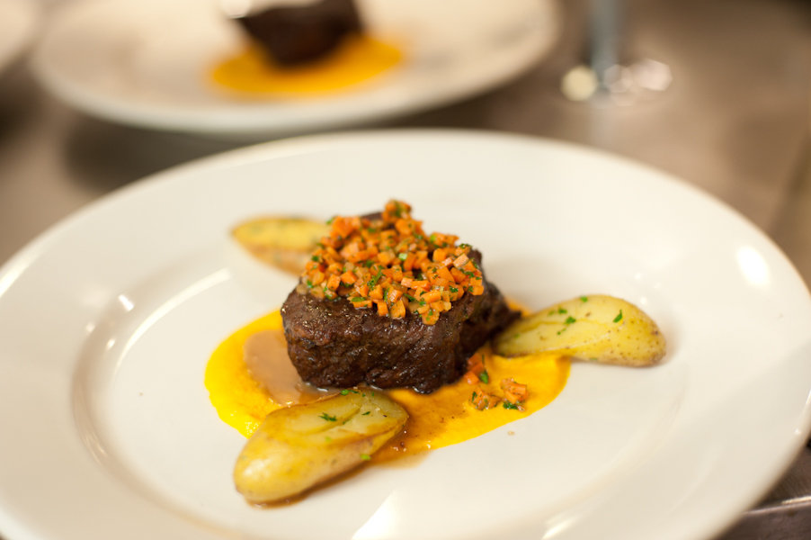 Chef French&#039;s braised New York strip with carrot mousseline, chardonnay poached fingerling potatoes and carrot gremolata