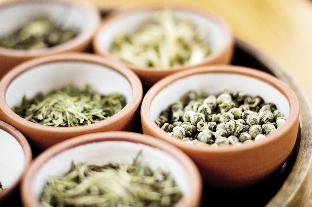 A selection of teas including Tian Mu Long Zhu, a green that unfurls from a ball when steeped
