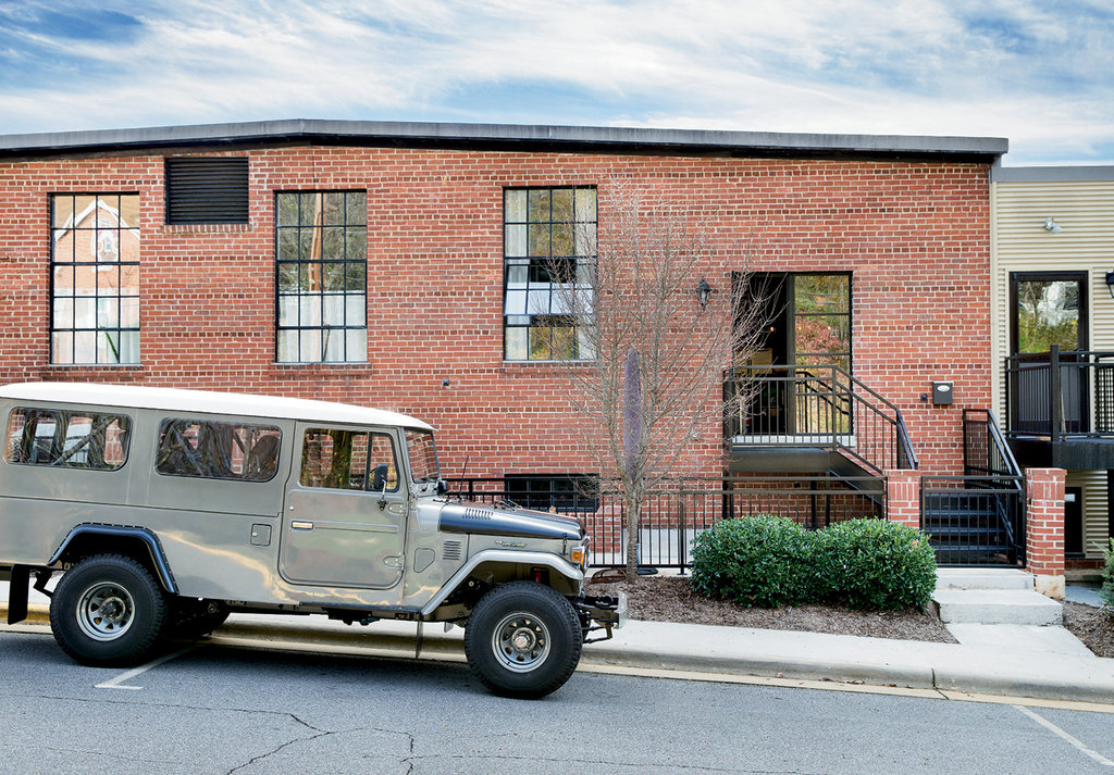 The 1979 Toyota Land Cruiser Hodge restored and retrofitted to seat four is often parked in front of his North Wilkesboro condo.