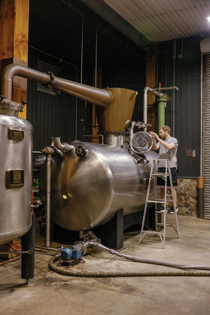 The mixture is heated in the still.