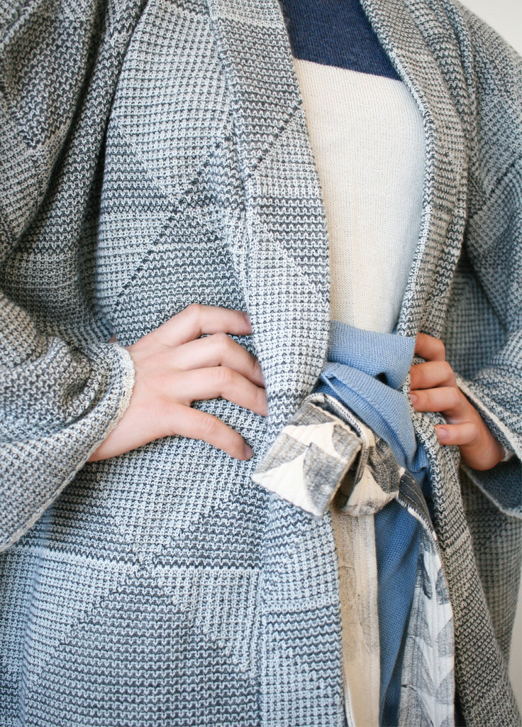 Inspired by the texture of tweed, Ansusinha’s super soft, oversized cardigan is made with baby alpaca wool. Here, she pairs it with an alpaca top and block-print wrap pants inspired by those worn by Thai fishermen.