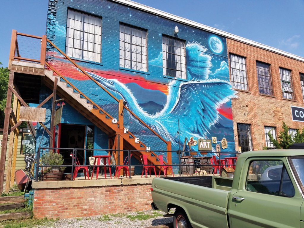 Visionary community leaders transformed Asheville’s derelict industrial district along the French Broad into the vibrant River Arts District.