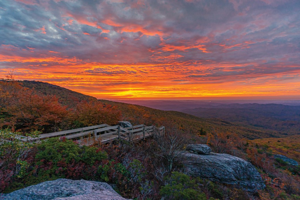 Fire sky: Sunrise at the Rough Ridge Overlook on Grandfather Mountain, as the clouds melt into ripples of amber.