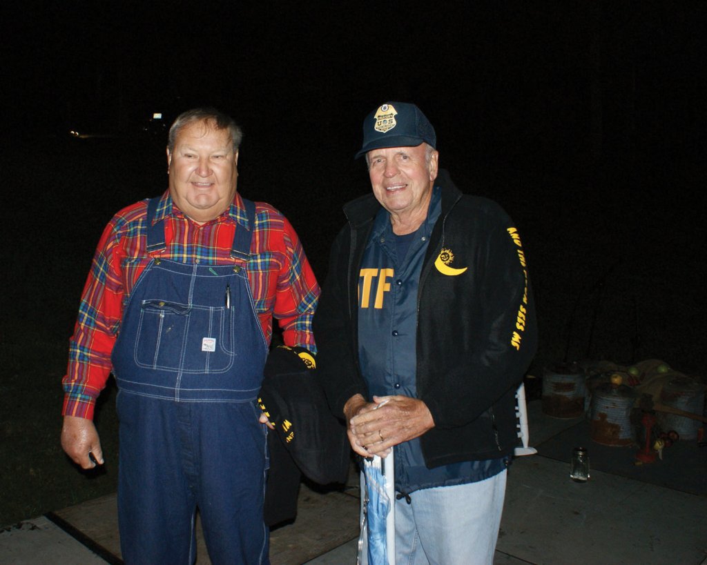 Willie Clay Call (left) and an ATF agent (right). The agency gave Call his iconic nickname, “The Uncatchable” because of his ability to evade law enforcement.