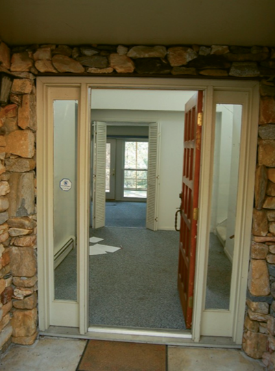Before shot of the entry, located on the lower level