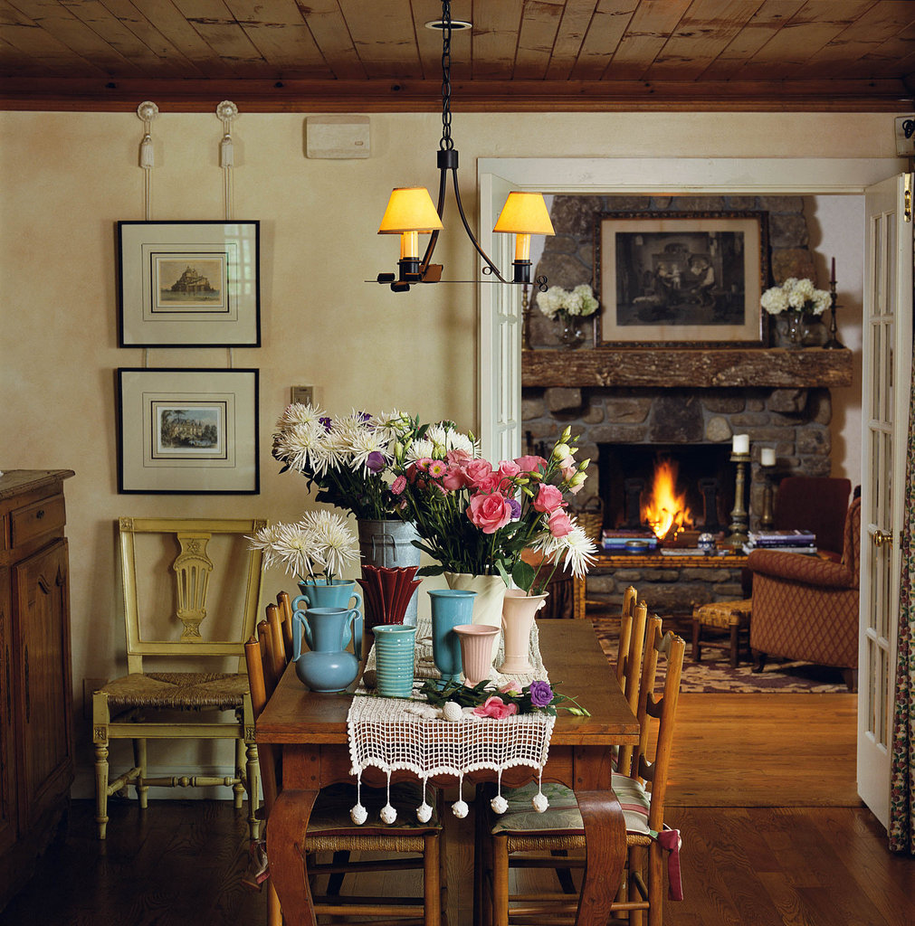 Natural Extension: The north wall of the house was replaced by a set of French doors that lead into the living room, an add-on headlined by a stone hearth Long commissioned based off a 1930s design found in a home in Blowing Rock.