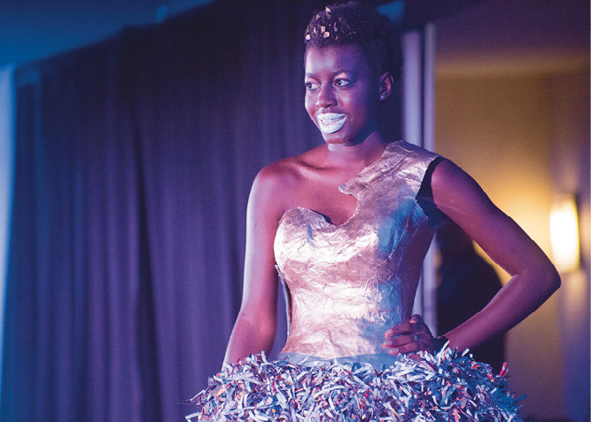 Nachele Johnson modeled her own dress in the Paper category.