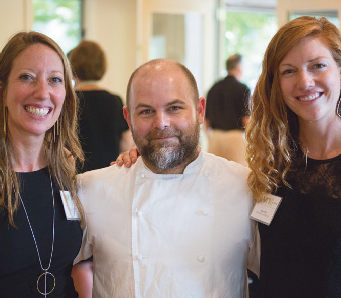 WNC staffers Melissa Reardon (left) and Katie Hild (right) with Chef Jaime Hernandez