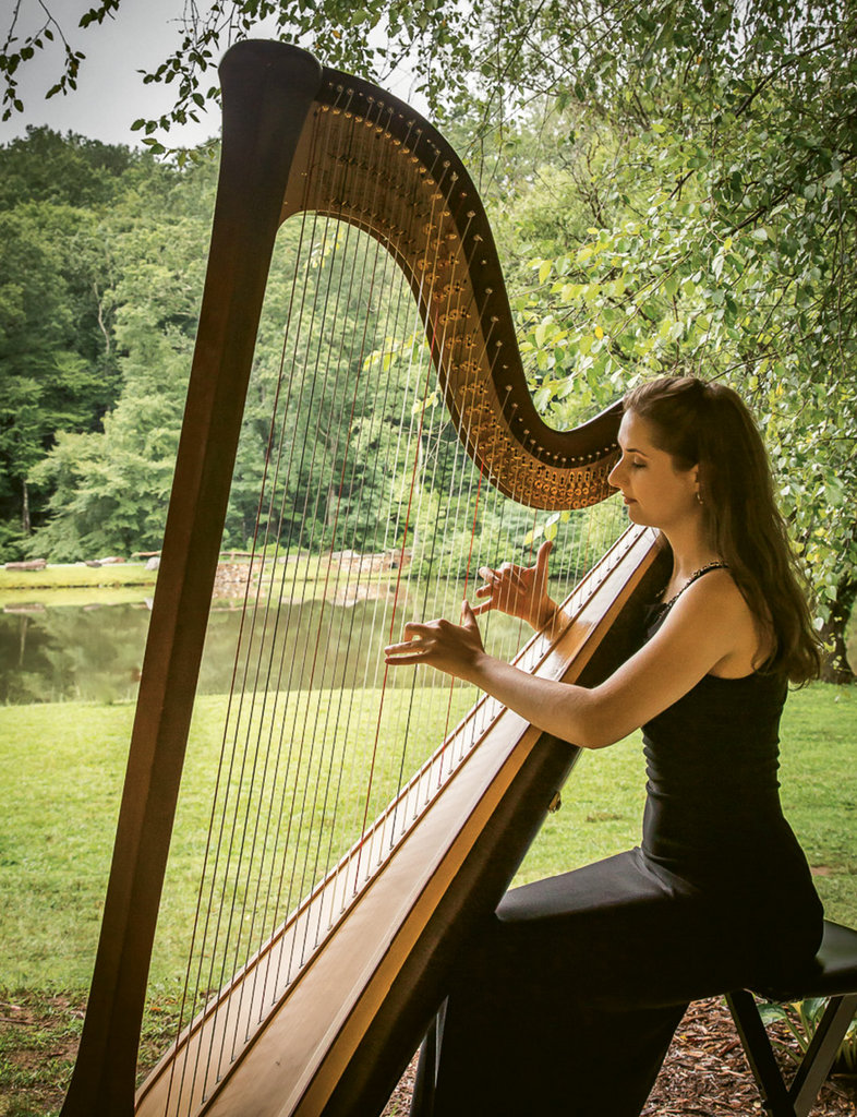 Natural Wonder: BMC’s 180-acre wooded campus offers an inspiring setting for students like harpist Anna Weigandt.