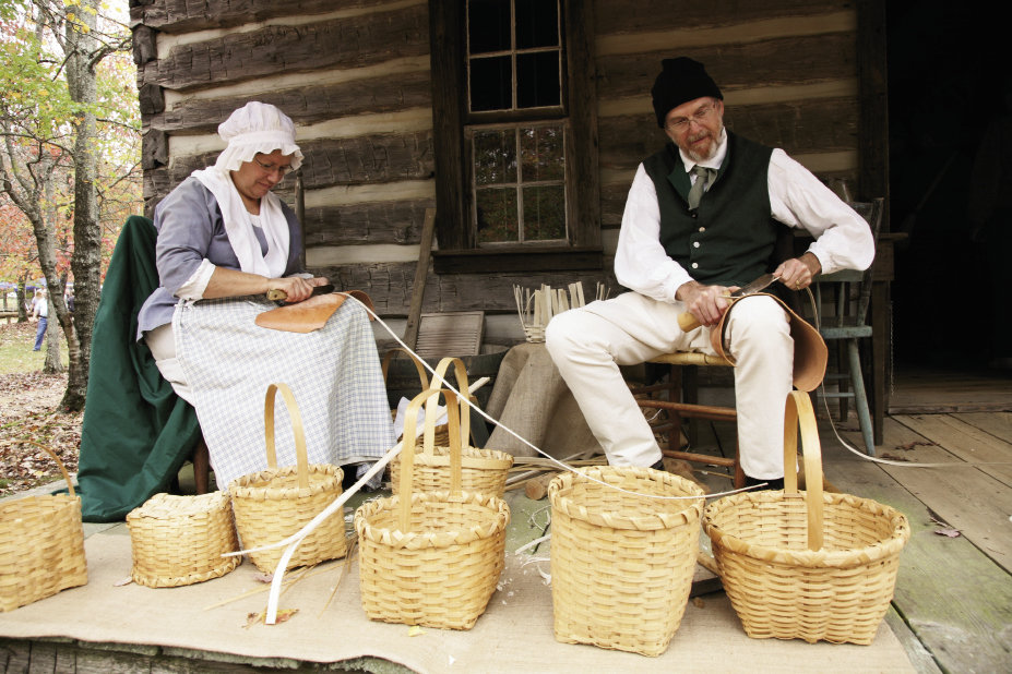 Hundreds of volunteers staff the festival as crafters, reenactors, and docents, sharing cultural practices from the 1700s and 1800s such as basketmaking and boiling peanuts.