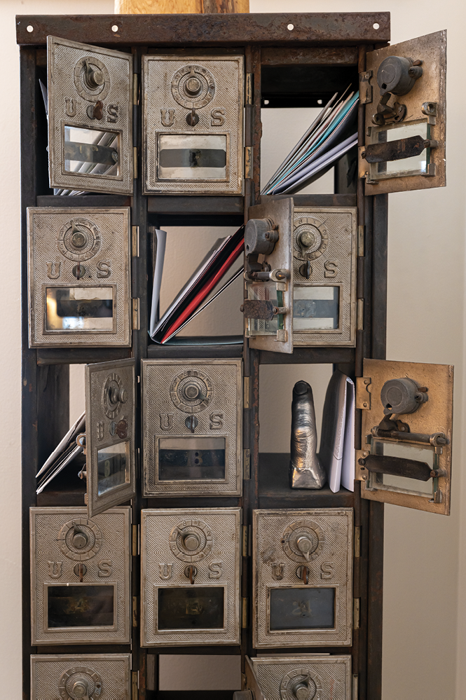 A bank of PO boxes houses letters of kindness and encouragement received through the years.