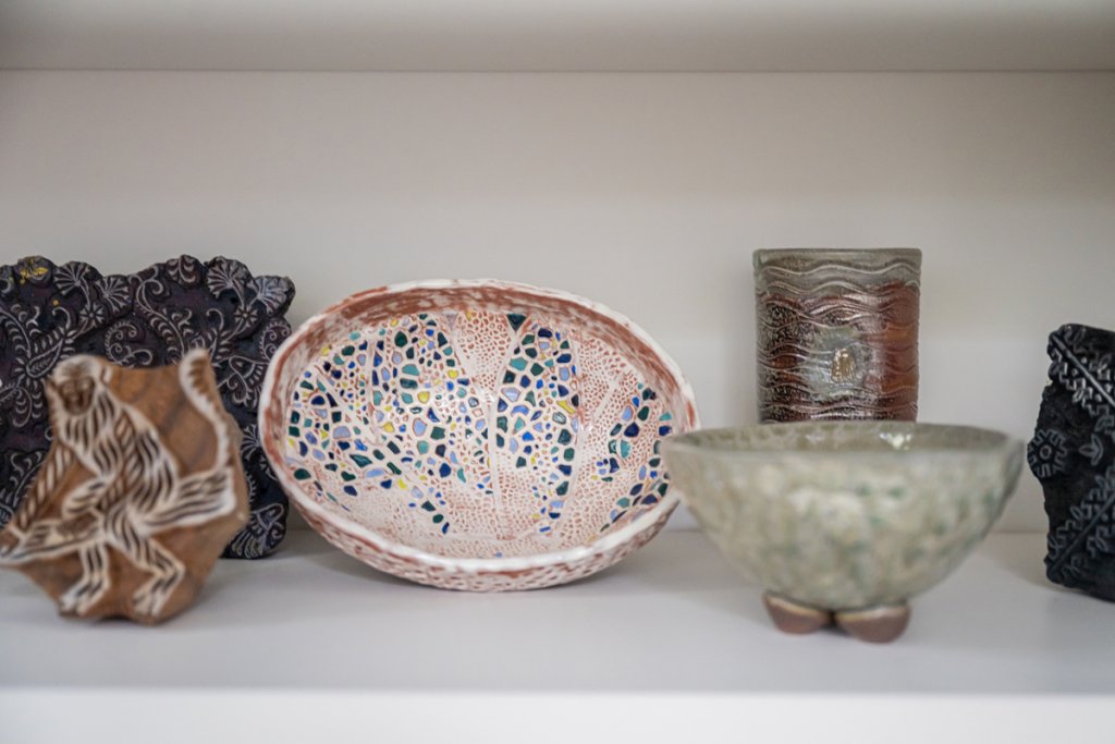 Tricia loves color, and even her more neutral pieces still have pops of blues and greens, which are incorporated throughout the home.