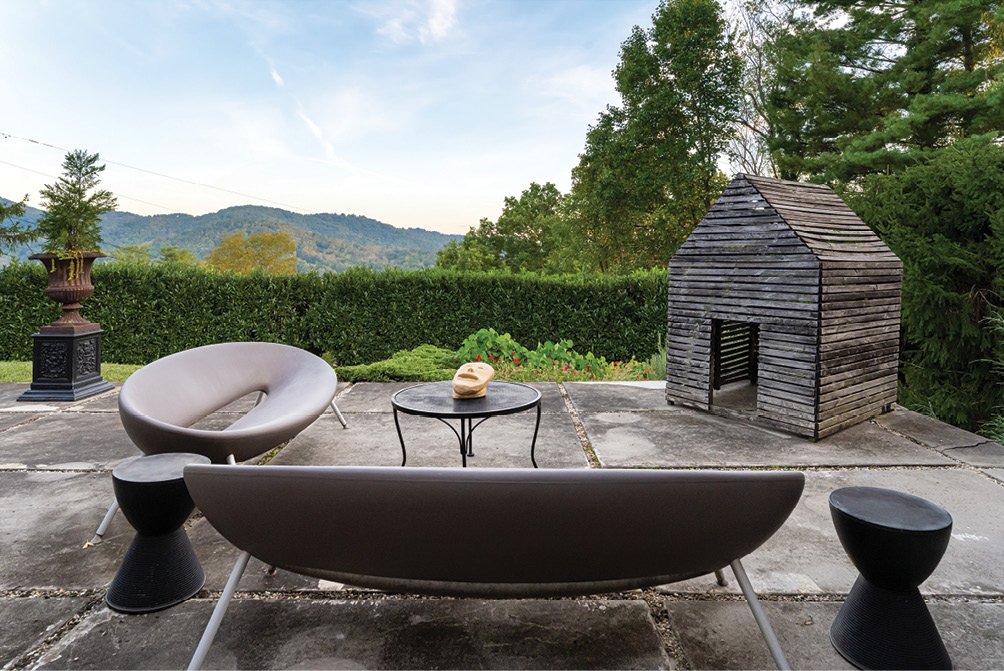 Long-range Views - King had a keen sense of how to integrate the modern home into Asheville’s topography. From this vantage in the North Asheville hills, the lights of the city twinkle at night, but there’s blissful privacy.