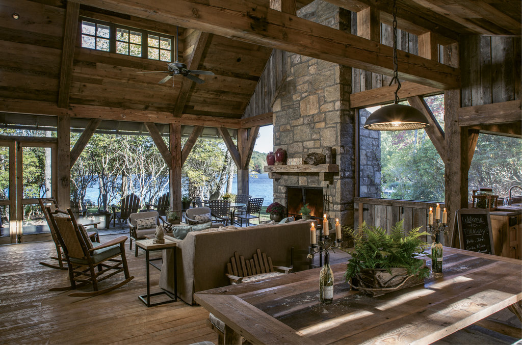 The screened porch (top) incorporates a living area with a fireplace, as well as a concealed TV, an outdoor kitchen and grill, and a dining table.