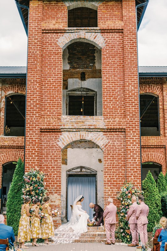 The couple incorporated a foot-washing ceremony to signify their life-long commitment of service to one another.