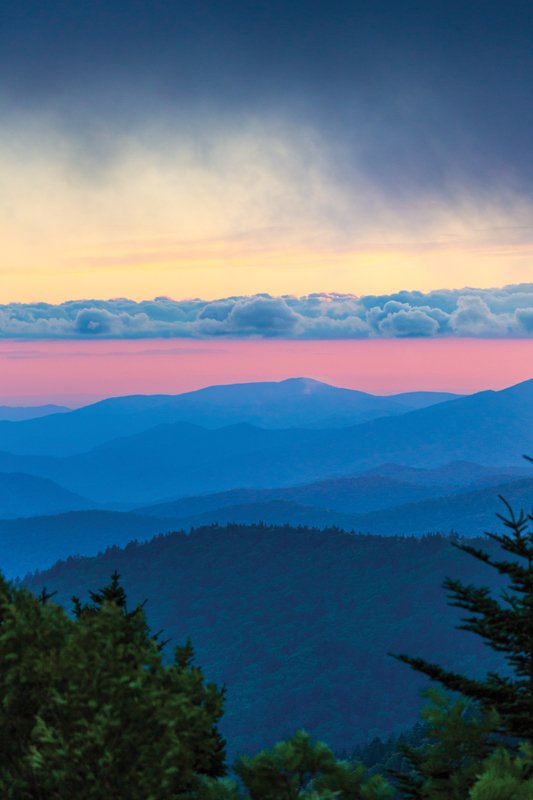 The summit of Clingmans Dome can be tricky to reach despite the half-mile trail being paved because of the steep elevation gain. But those who make the journey are rewarded with boundless views of the Smokies.