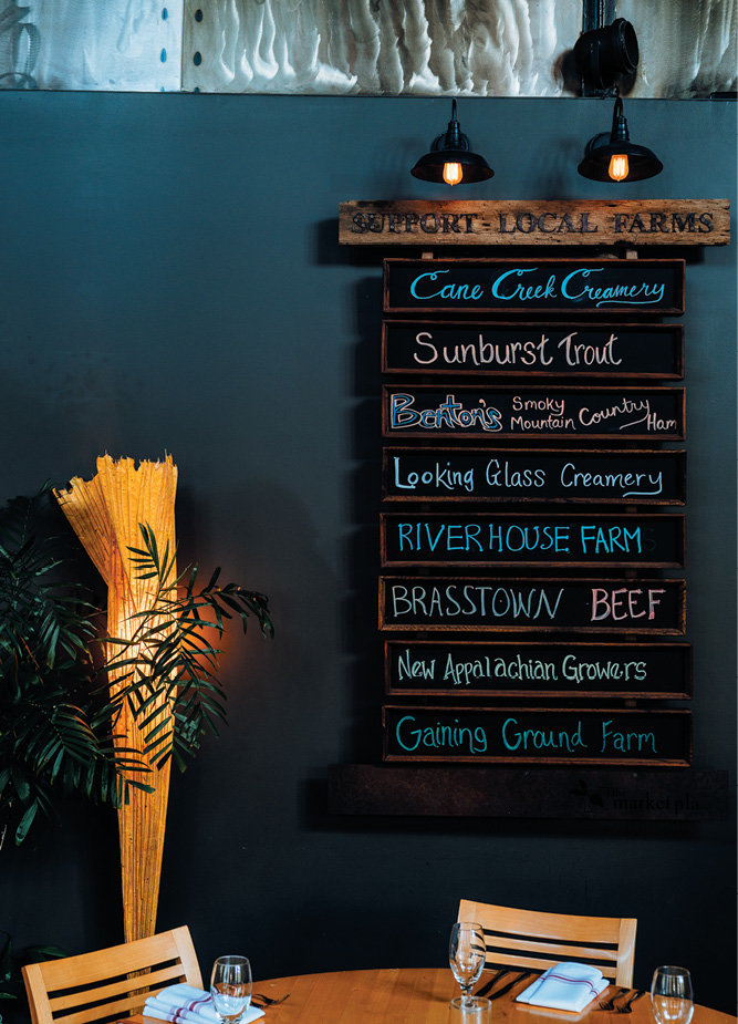 At Dissen’s restaurant, The Market Place, signage displays some of the regional farms, creameries, and other food producers where he gets his ingredients.