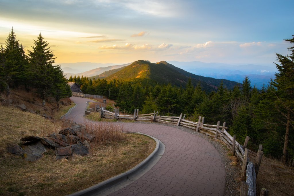 Sunshine Over Mount - Mitchell Clay Townsend A photographer overlooks the Blue Ridge Mountains from the highest peak east of the Mississippi River. {Professional} @clay.townsend