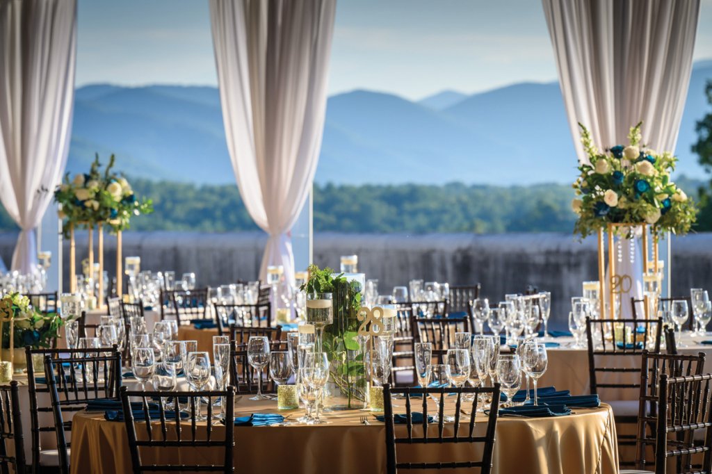 Open-air seating against the backdrop of the Blue Ridge await guests at the reception.