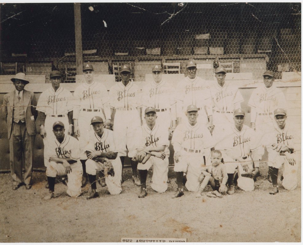 The Asheville Blues were led by owner and manager Clarence M. Moore Sr. (kneeling at left, front row). Moore played for the Asheville Black Tourists in the 1930s, but he changed the name of the team because he wanted the club to have its own identity.