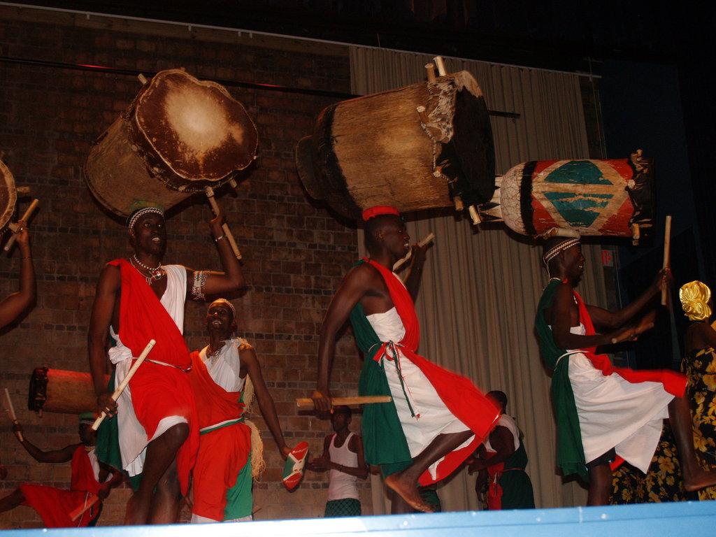 Dressed in the red, white, and green of the Burundian flag