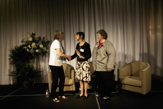 Jeannie Eblen (left) congratulated Eliada Homes staff Tami Ruckman and Nora Scheff.