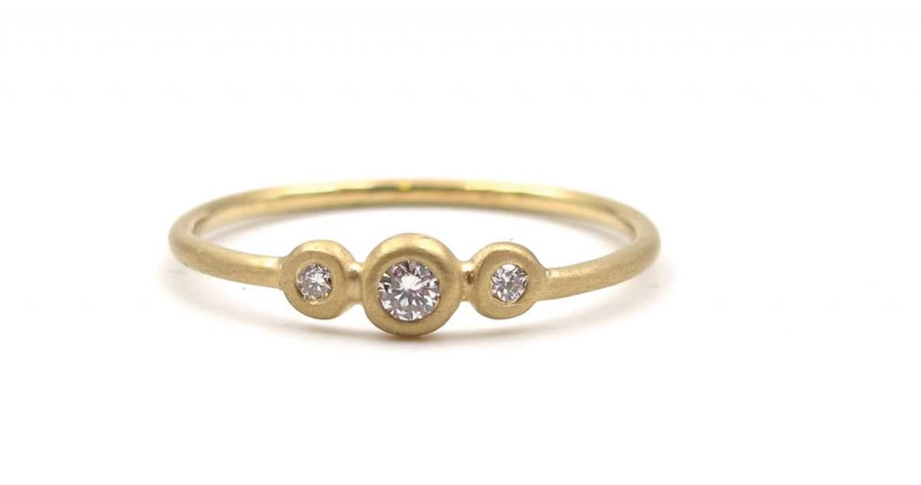 Simply Lovely - The Sweetest Gold &amp; Diamond Ring. Yellow gold with a 2mm center stone and adjacent stones on either side at 1.7 mm. $800. Joanna Gollberg, Asheville. joannagollberg.com