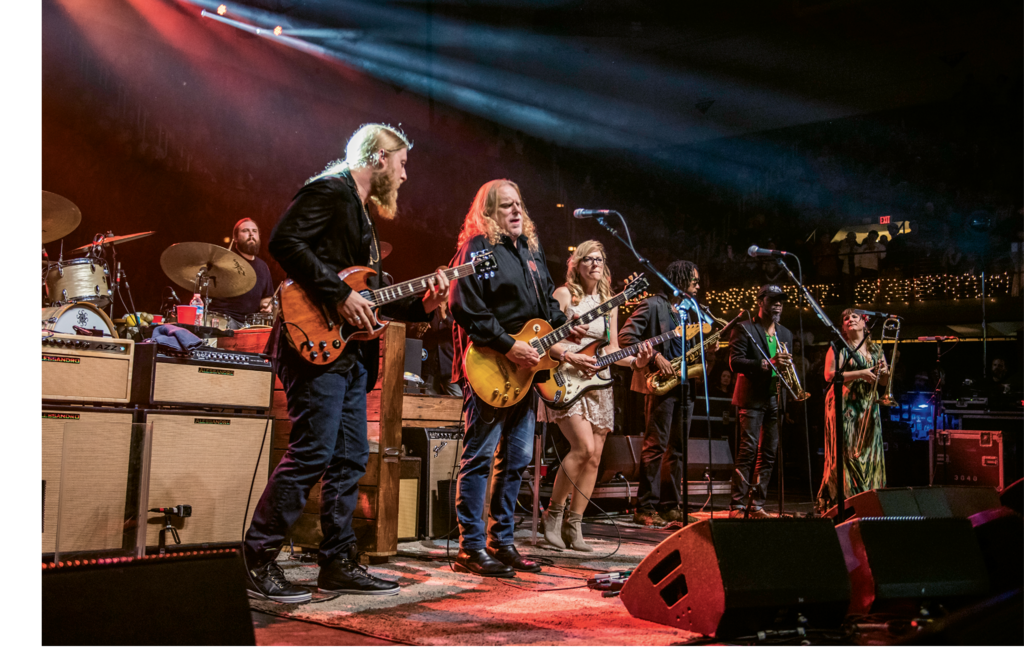 Tedeschi Trucks Band, featuring Derek Trucks (left) and wife Susan Tedeschi (right) joined Haynes on stage during the 2015 Christmas Jam.